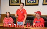Gary Joint signs a letter-of-intent to wrestle for Fresno State. He's flanked by father Kevin and Mom Melissa.
